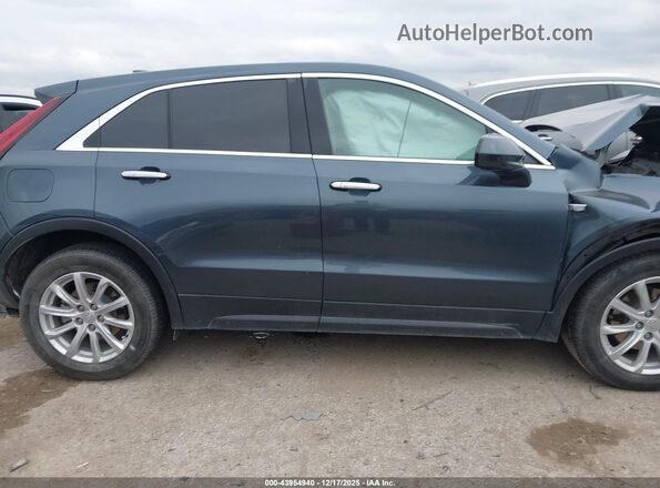 1GYAZAR46MF063249 2021 CADILLAC XT4 Black Widok wnętrza z tyłu