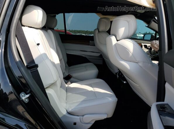 1GYC3NML4TZ700989 2026 CADILLAC VISTIQ Black Widok wnętrza z tyłu