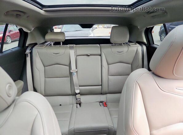 1GYFZCR48MF083052 2021 CADILLAC XT4 Black Rear seats view