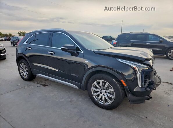 1GYFZCR48MF083052 2021 CADILLAC XT4 Black Front right