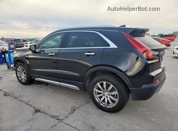 1GYFZCR48MF083052 2021 CADILLAC XT4 Black Rear left