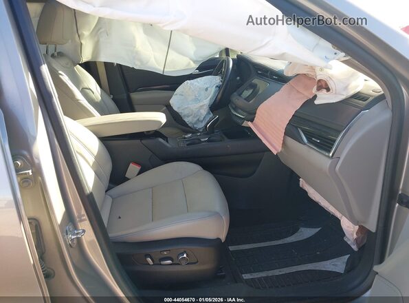 1GYFZCR4XNF159159 2022 CADILLAC XT4 Gold წინა სალონის ხედი