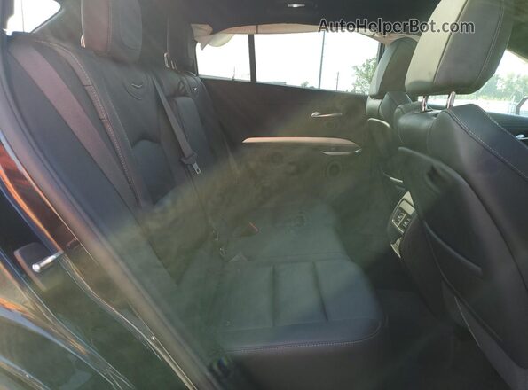 1GYFZDR40PF101649 2023 CADILLAC XT4 Charcoal Widok wnętrza z tyłu