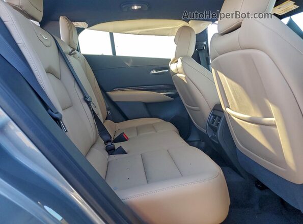 1GYFZDR41SF147578 2025 CADILLAC XT4 Gray Vista interior trasera