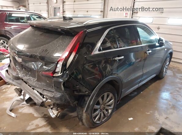 1GYFZDR42MF013083 2021 CADILLAC XT4 Black Trasero derecho