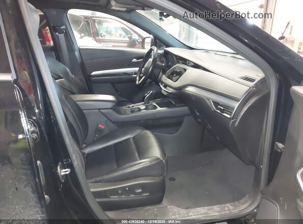 1GYFZDR42MF013083 2021 CADILLAC XT4 Black Vista interior delantera