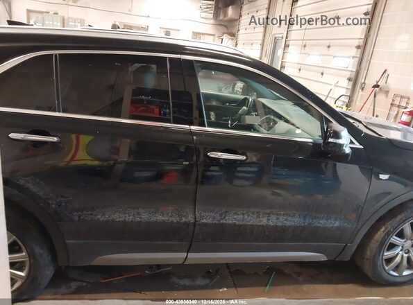 1GYFZDR42MF013083 2021 CADILLAC XT4 Black Vista interior trasera