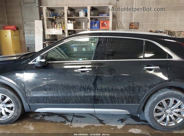 1GYFZDR42MF013083 2021 CADILLAC XT4 Black Vista interior de 360 grados
