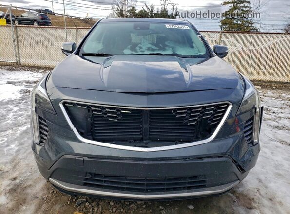 1GYFZDR43MF030233 2021 CADILLAC XT4 Blue Հետևի տեսք