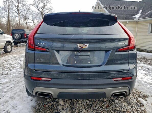 1GYFZDR43MF030233 2021 CADILLAC XT4 Blue Սալոնի դիմացի տեսք