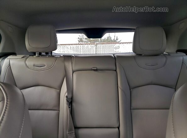 1GYFZDR43MF030233 2021 CADILLAC XT4 Blue Սալոնի հետևի տեսք