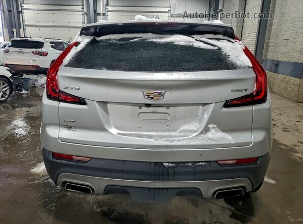 1GYFZDR43NF139146 2022 CADILLAC XT4 Silver Rear view