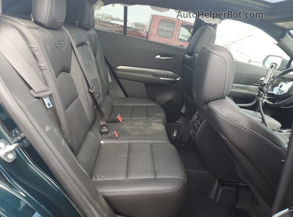 1GYFZDR44RF190516 2024 CADILLAC XT4 Черный Вид задней части салона