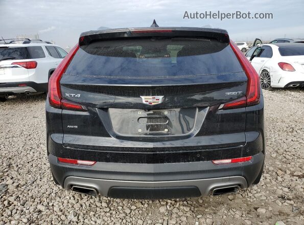 1GYFZDR46MF069737 2021 CADILLAC XT4 Black Հետևի տեսք