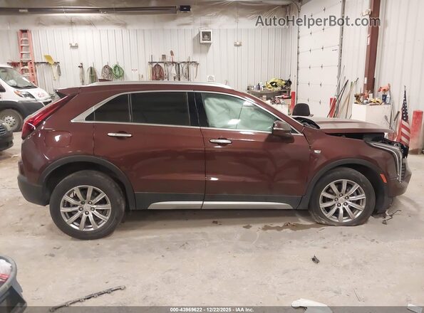 1GYFZDR47NF111043 2022 CADILLAC XT4 Purple უკანა სალონის ხედი