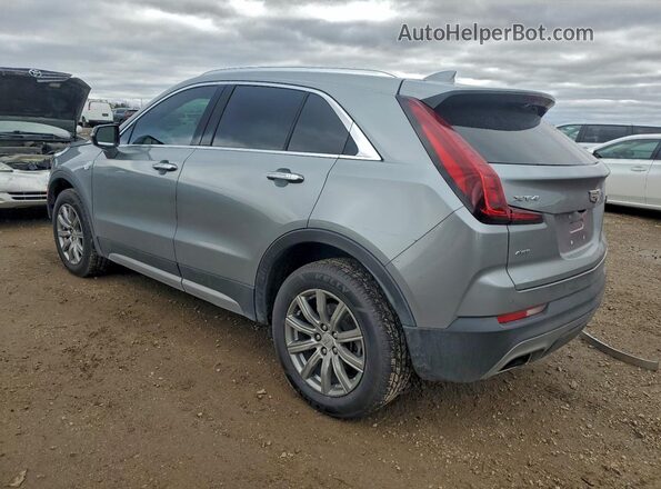 1GYFZDR48PF192377 2023 CADILLAC XT4 Silver Rear left