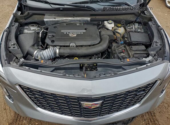 1GYFZDR48PF192377 2023 CADILLAC XT4 Silver Rear interior view