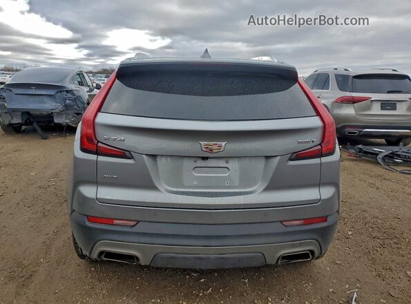 1GYFZDR48PF192377 2023 CADILLAC XT4 Silver Rear view