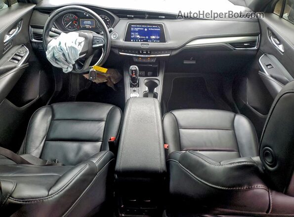 1GYFZDR48PF192377 2023 CADILLAC XT4 Silver Dashboard view