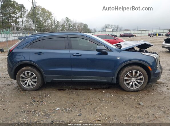1GYFZER4XKF189477 2019 CADILLAC XT4 Blue Սալոնի հետևի տեսք