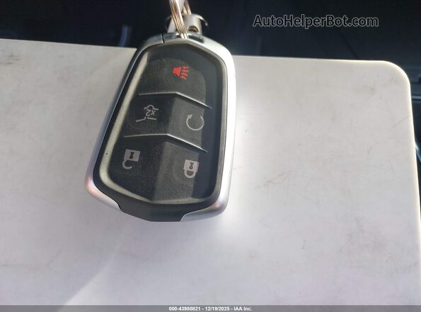 1GYFZFR4XPF225391 2023 CADILLAC XT4 Maroon Widok deski rozdzielczej