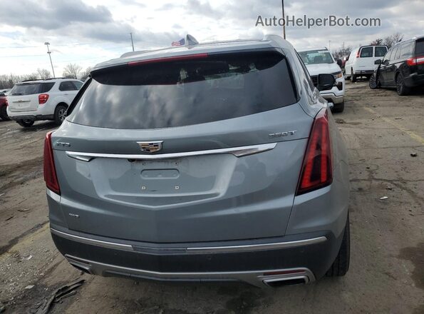 1GYKNDR48PZ167858 2023 CADILLAC XT5 Gray Rear view