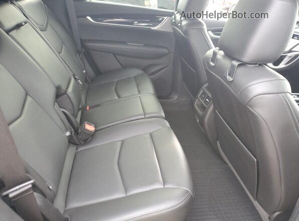 1GYKNDR48PZ167858 2023 CADILLAC XT5 Gray Rear interior view