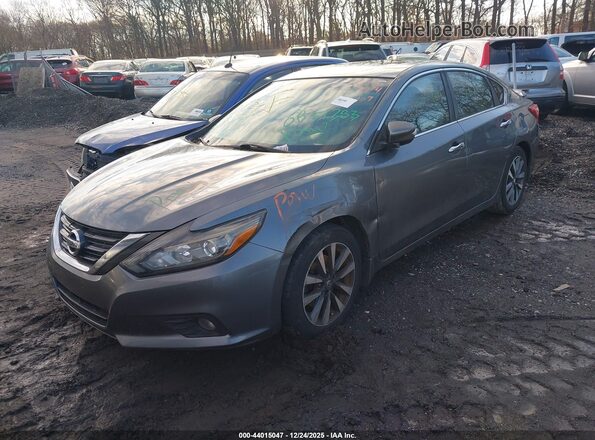 1N4AL3AP7GC284234 2016 NISSAN ALTIMA Gray Vista tres cuartos delantera izquierda