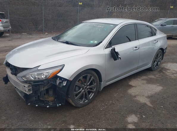 1N4AL3AP8GC145455 2016 NISSAN ALTIMA Silver Vista tres cuartos delantera izquierda