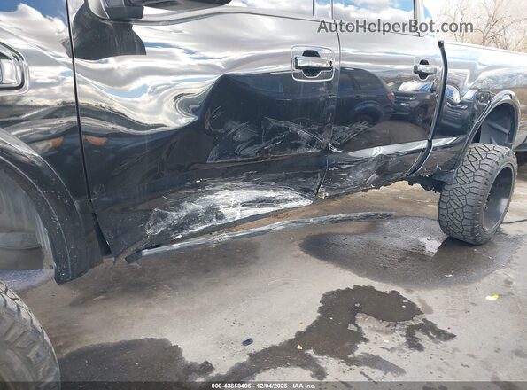 1N6BA1F46HN506997 2017 NISSAN TITAN XD Черный Вид спереди