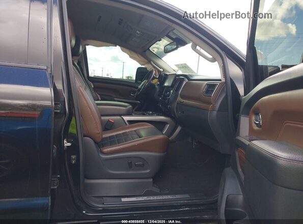 1N6BA1F46HN506997 2017 NISSAN TITAN XD Черный Вид салона спереди