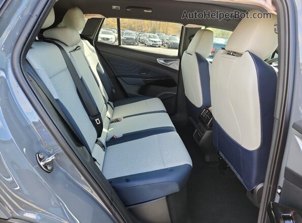 1V2JSPE8XSC007429 2025 VOLKSWAGEN ID.4 Gray Vista interior trasera