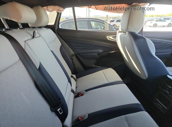1V2WSPE80SC001127 2025 VOLKSWAGEN ID.4 Gray Widok wnętrza z tyłu