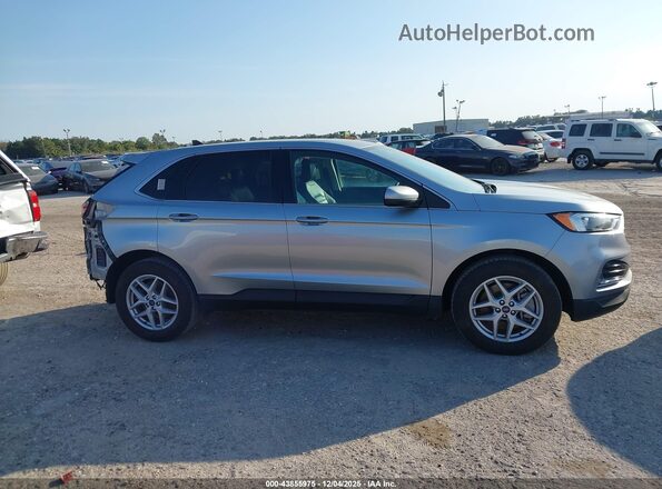 2FMPK4J98NBA93977 2022 FORD EDGE Silver Widok wnętrza z tyłu
