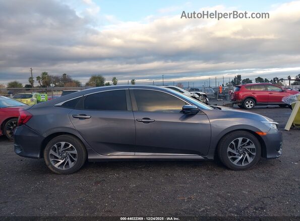 2HGFC2F77JH529591 2018 HONDA CIVIC Gray უკანა სალონის ხედი