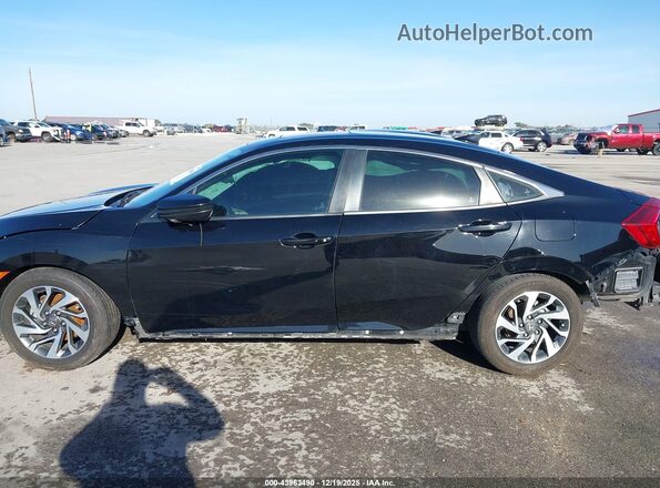 2HGFC2F79JH502490 2018 HONDA CIVIC Black უკანა სალონის ხედი