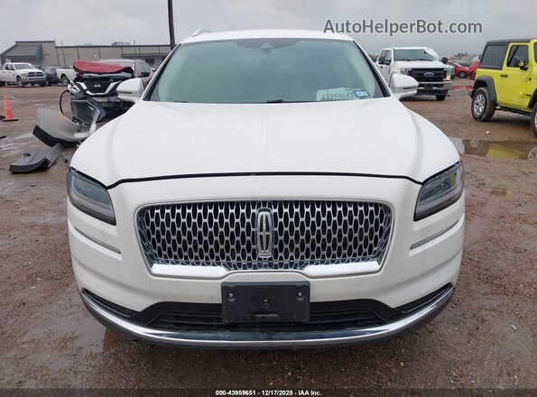 2LMPJ6J92NBL07199 2022 LINCOLN NAUTILUS White Vista interior trasera