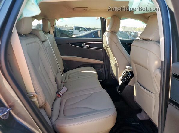 2LMPJ6J92PBL04323 2023 LINCOLN NAUTILUS Gray Вид задньої частини салону