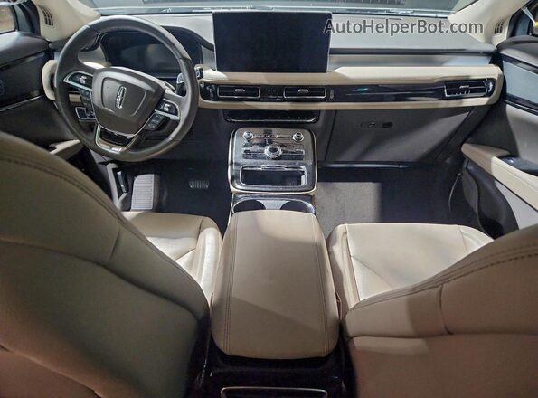 2LMPJ6J9XPBL04280 2023 LINCOLN NAUTILUS Tan Vista del salpicadero