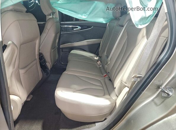 2LMPJ6J9XPBL04280 2023 LINCOLN NAUTILUS Tan Vista interior trasera