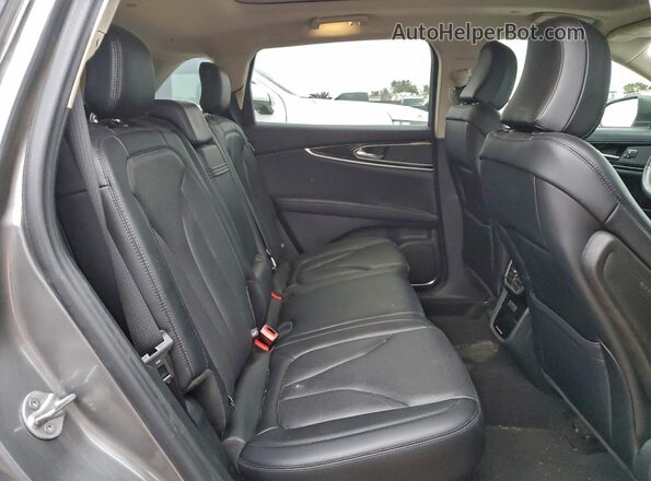 2LMPJ6K95NBL08653 2022 LINCOLN NAUTILUS Gray Rear interior view