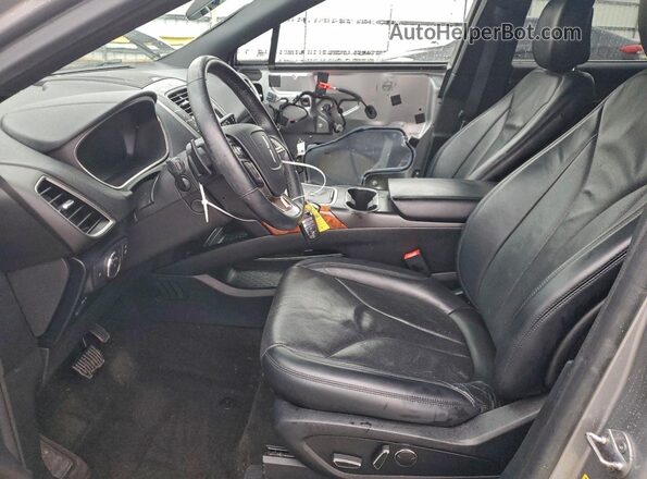 2LMPJ8KP9LBL15306 2020 LINCOLN NAUTILUS Серебряный Вид салона спереди