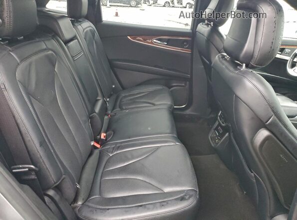 2LMPJ8KP9LBL15306 2020 LINCOLN NAUTILUS Серебряный Вид задней части салона