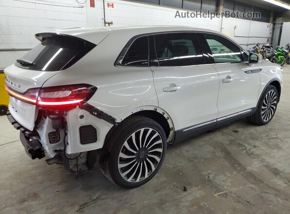 2LMPJ9JP5PBL21066 2023 LINCOLN NAUTILUS White Trasero derecho