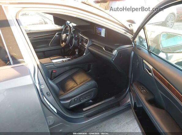 2T2BGMCAXKC033477 2019 LEXUS RX 450H Серый Вид салона спереди