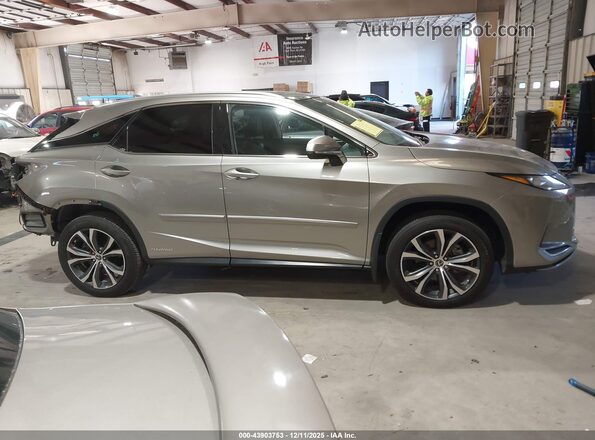 2T2HGMDAXMC061758 2021 LEXUS RX 450H Silver 360 interior view