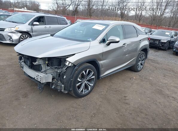 2T2HZMDA7LC226626 2020 LEXUS RX 350 Silver Vista tres cuartos delantera izquierda