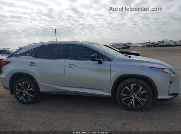 2T2ZZMCA8KC118536 2019 LEXUS RX 350 Silver Widok wnętrza z tyłu