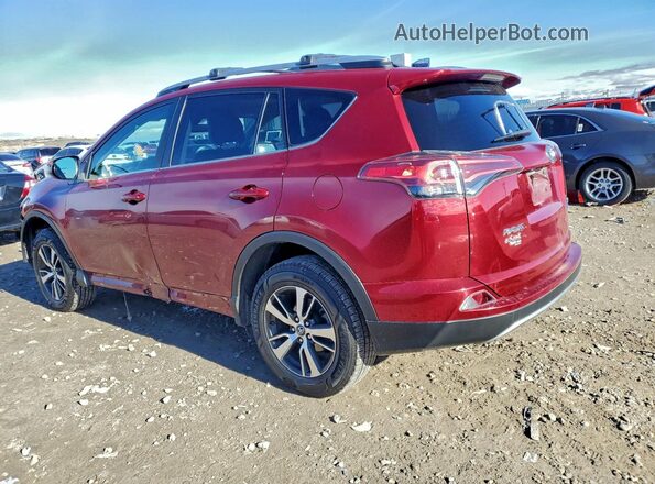 2T3RFREV4JW778877 2018 TOYOTA RAV4 Red Rear left