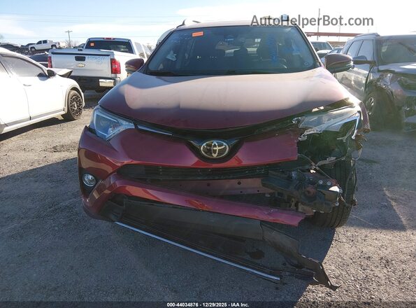 2T3RFREV8JW834870 2018 TOYOTA LE Maroon Սարքավորումների վահանակի տեսք